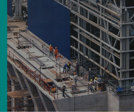 Employees walk and work at Vale's site.