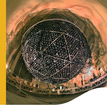 Large metal sphere hanging in an underground location.