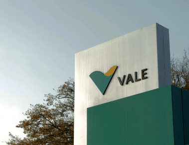 Photo of a sign with Vale logo and a tree in the background.